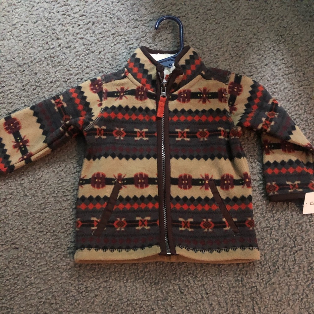 NWT. Size 12 months. Carters zip up fleece jacket